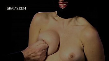 Masked slut get her boobs squeezed