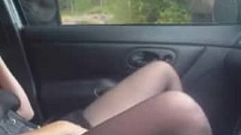 Horny slut in car having fun with strangers